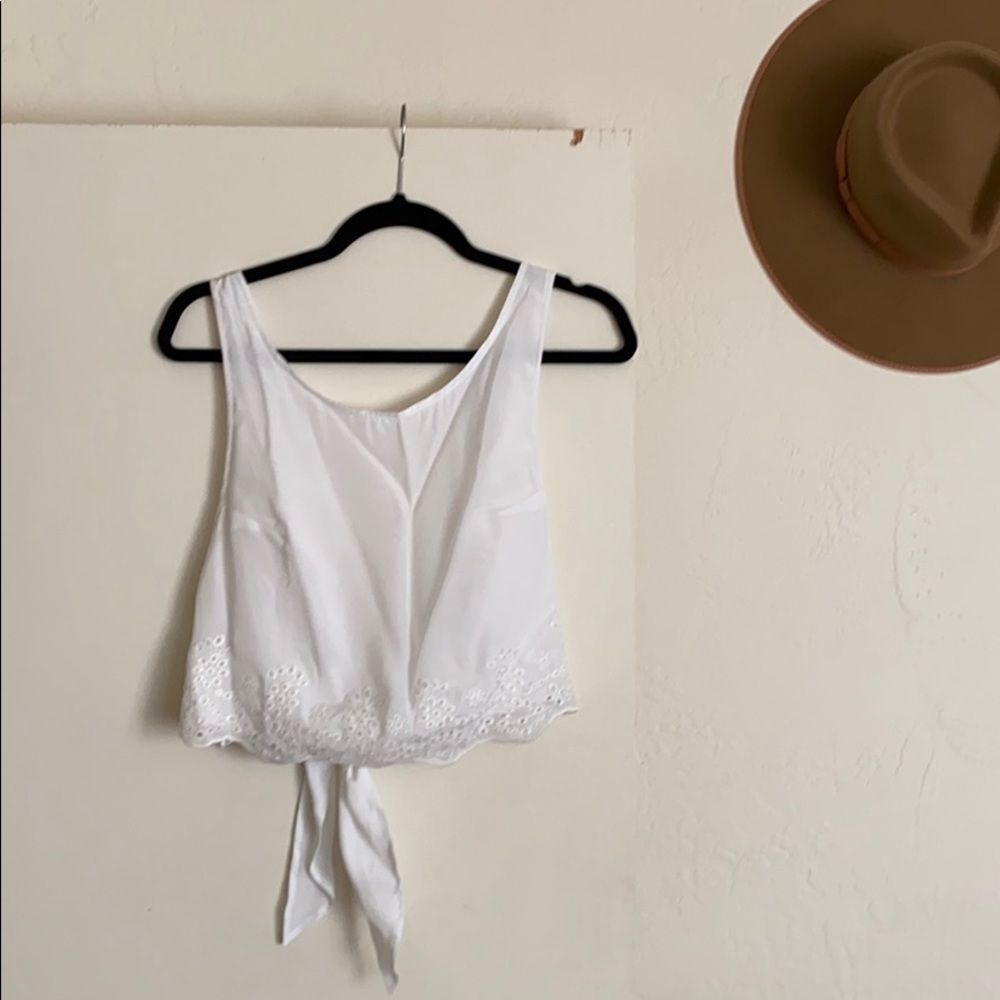 Little silky white crop top. I’ve never worn it